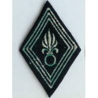 Légion Etrangère , losange de bras militaire du rang, bombe évidée, tissu