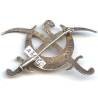 En argent , 2° Régiment de Spahis Algériens , sabres croisés, poinçonné, numéroté 10