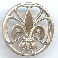 Insigne Scout, fixation par...