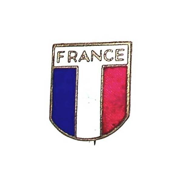 "France" dans un T blanc , écu tricolore  20x23, émail, fabrication US ou GB